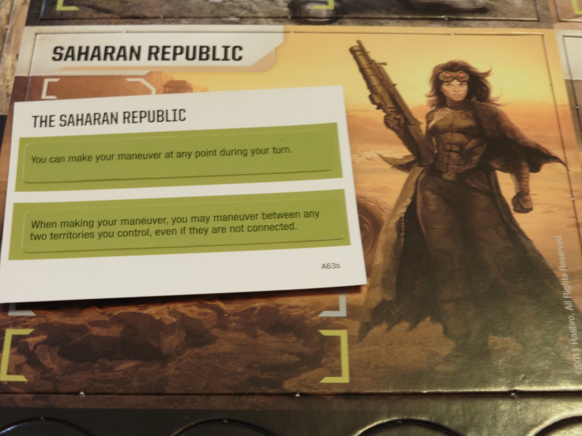 The Saharan army's card, with the starting power card containing the choice of which power to use and lose.